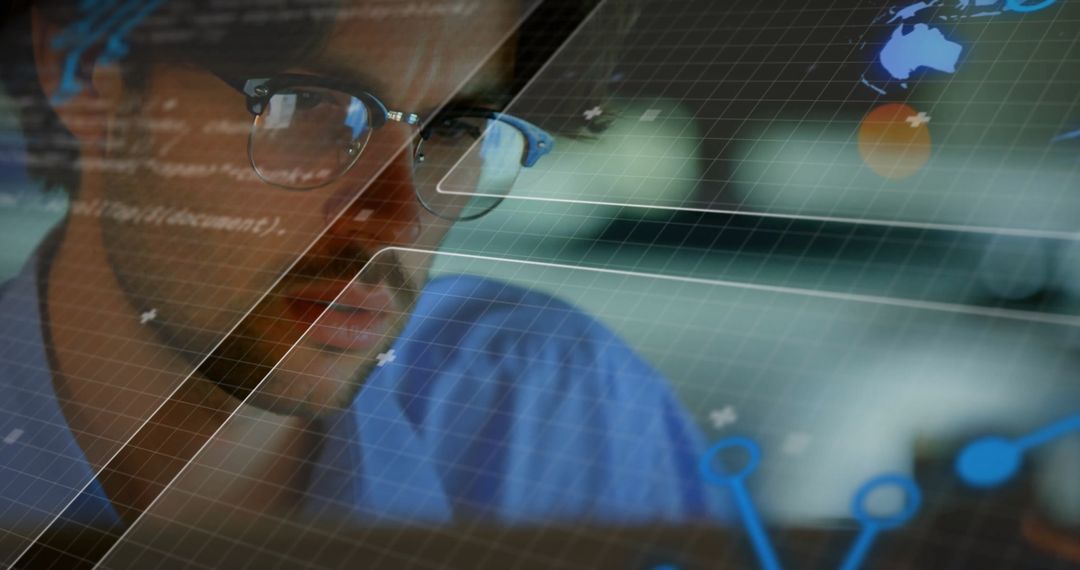 Focused Programmer Overlaid with Futuristic Data and Charts