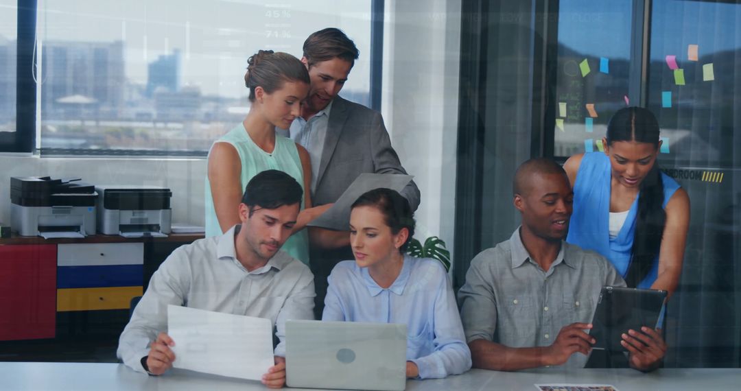 Team Collaborating on Project with Digital Interface Overlay