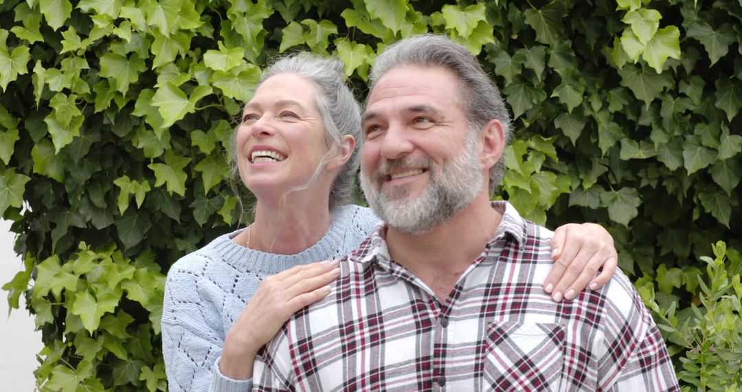 Senior Couple Smiling in Garden Setting