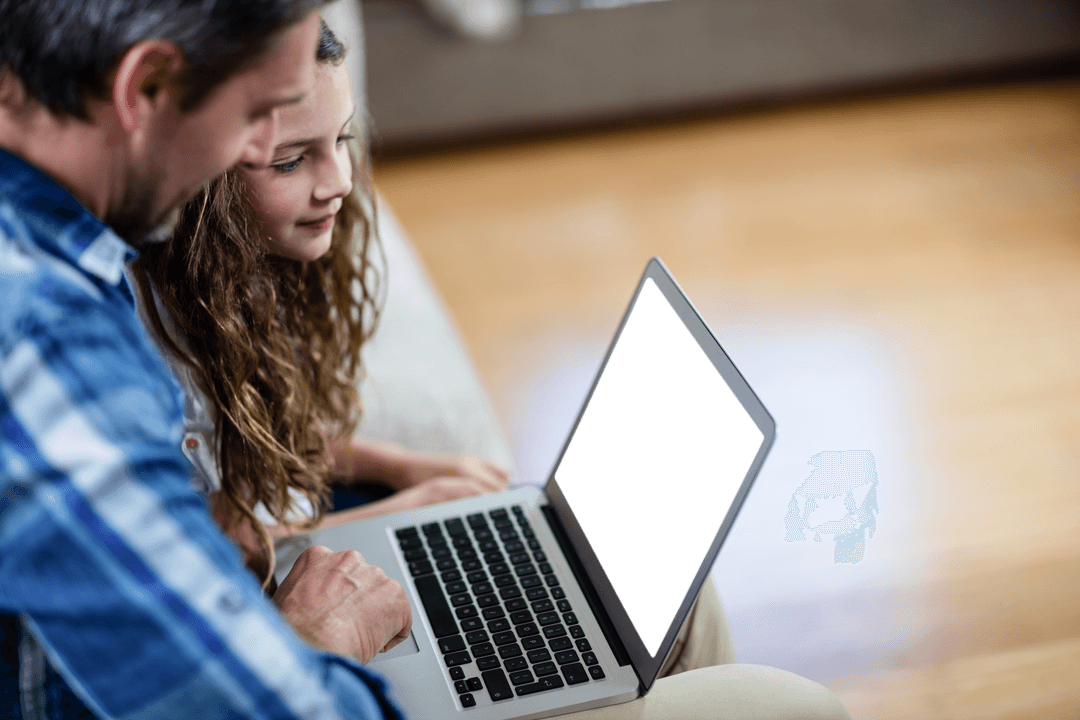 Father and Daughter Using Transparent Laptop at Home
