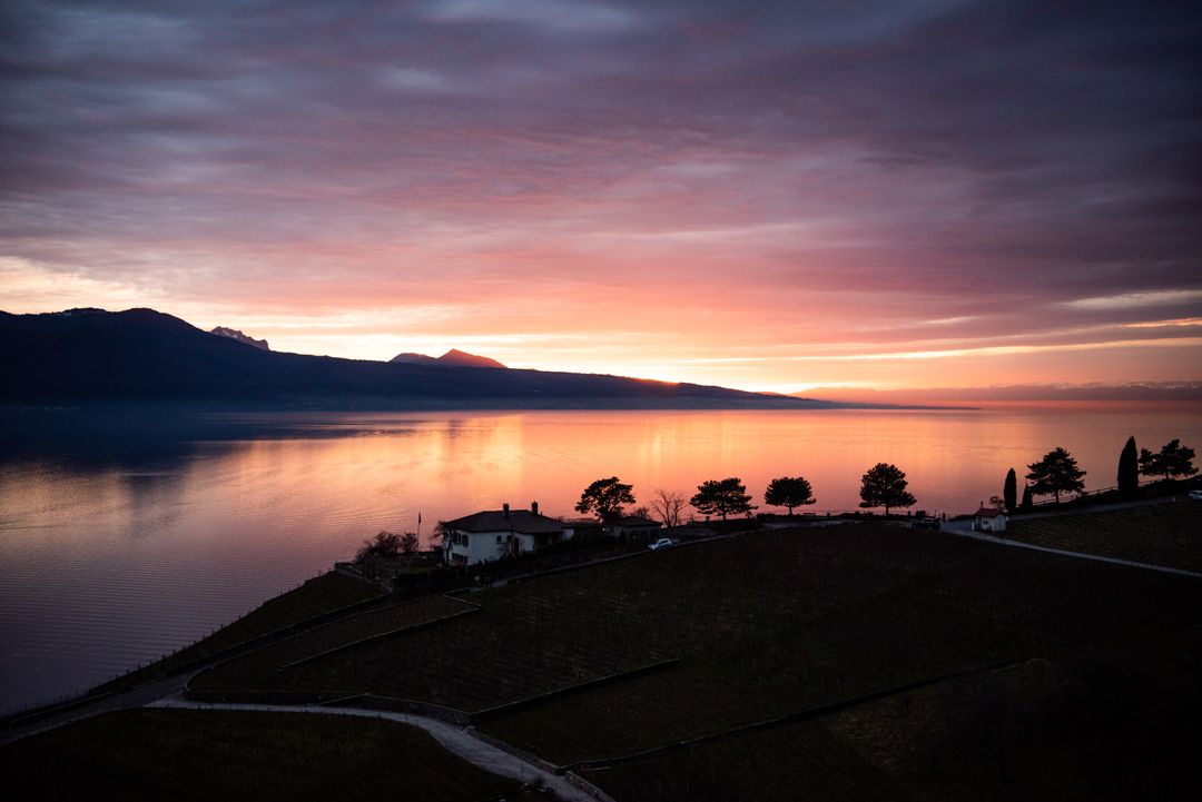 Cover background stunning lake view at dusk with vibrant sunset reflection