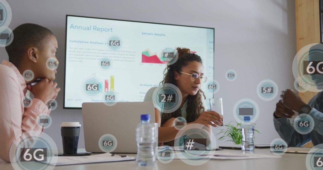 Diverse Team Analyzing 6G Annual Report in Modern Office