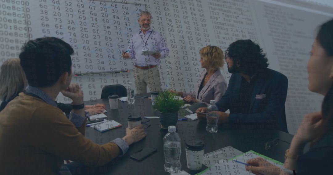 Business People Analyzing Financial Data in Meeting