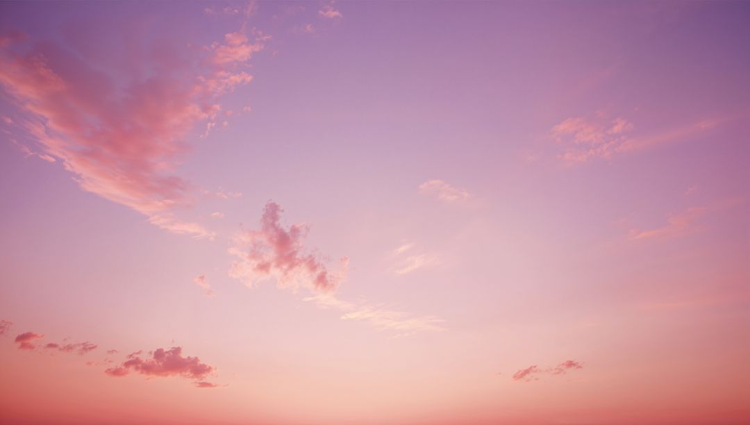 Pastel Sky at Dawn with Pink and Violet Clouds