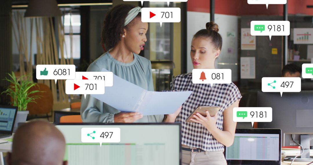 Marketing Team Analyzing Social Media Metrics in Modern Office