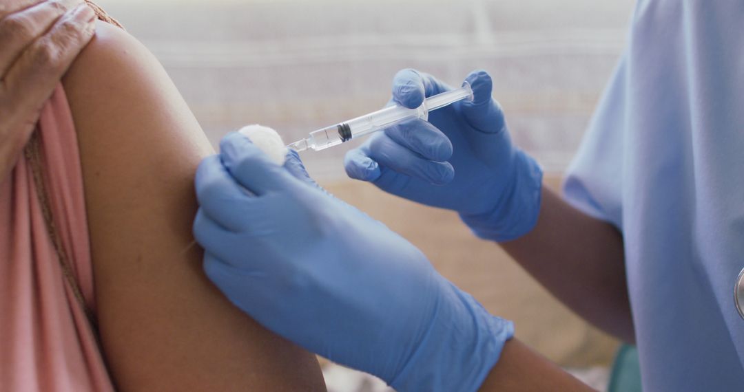 Healthcare Worker Administering Vaccine Injection to Patient - Free Images, Stock Photos and Pictures on Pikwizard.com