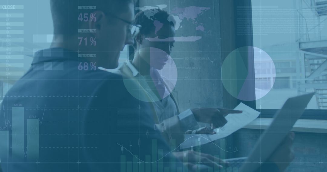 Business Professionals Using Data Analytics on Laptop