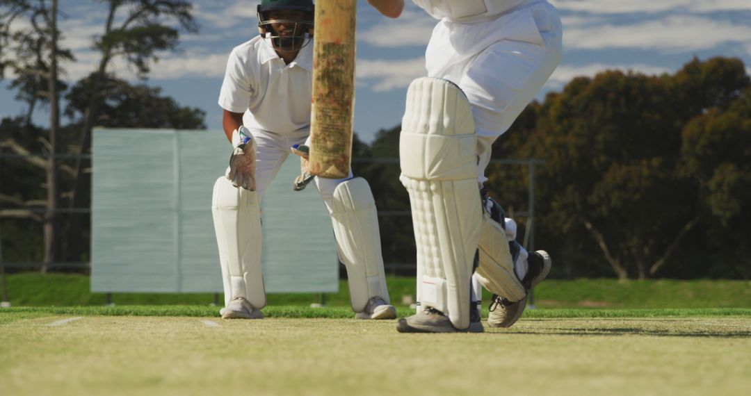 Close-Up View of Cricket Match with Batsman and Wicket-Keeper - Free Images, Stock Photos and Pictures on Pikwizard.com