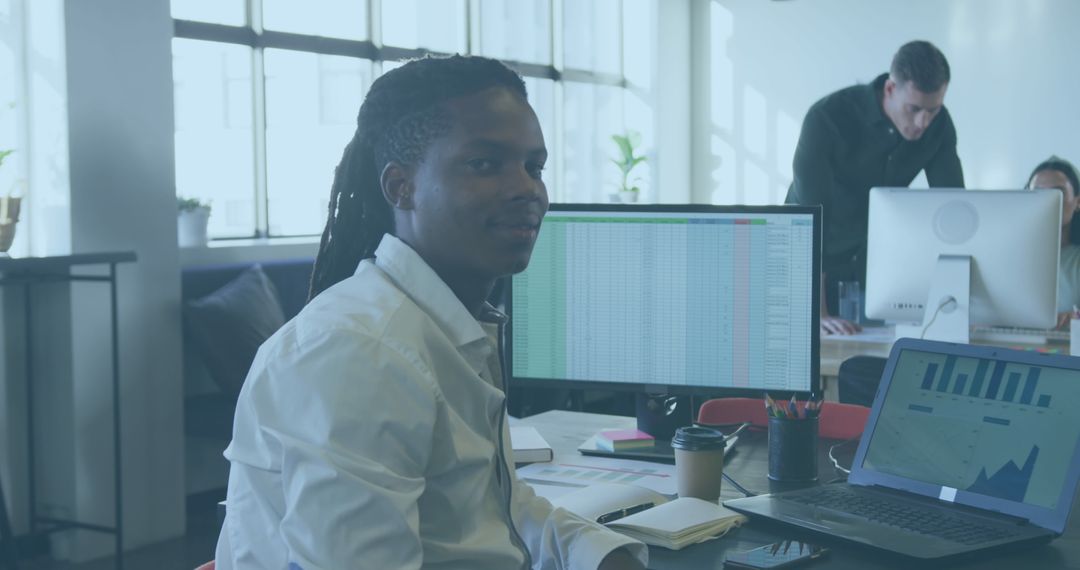 Focused Professional Analyzing Data in Modern Office