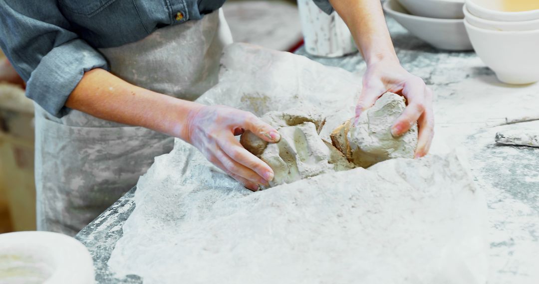 Pottery Artist Preparing Clay In Workshop - Free Images, Stock Photos and Pictures on Pikwizard.com