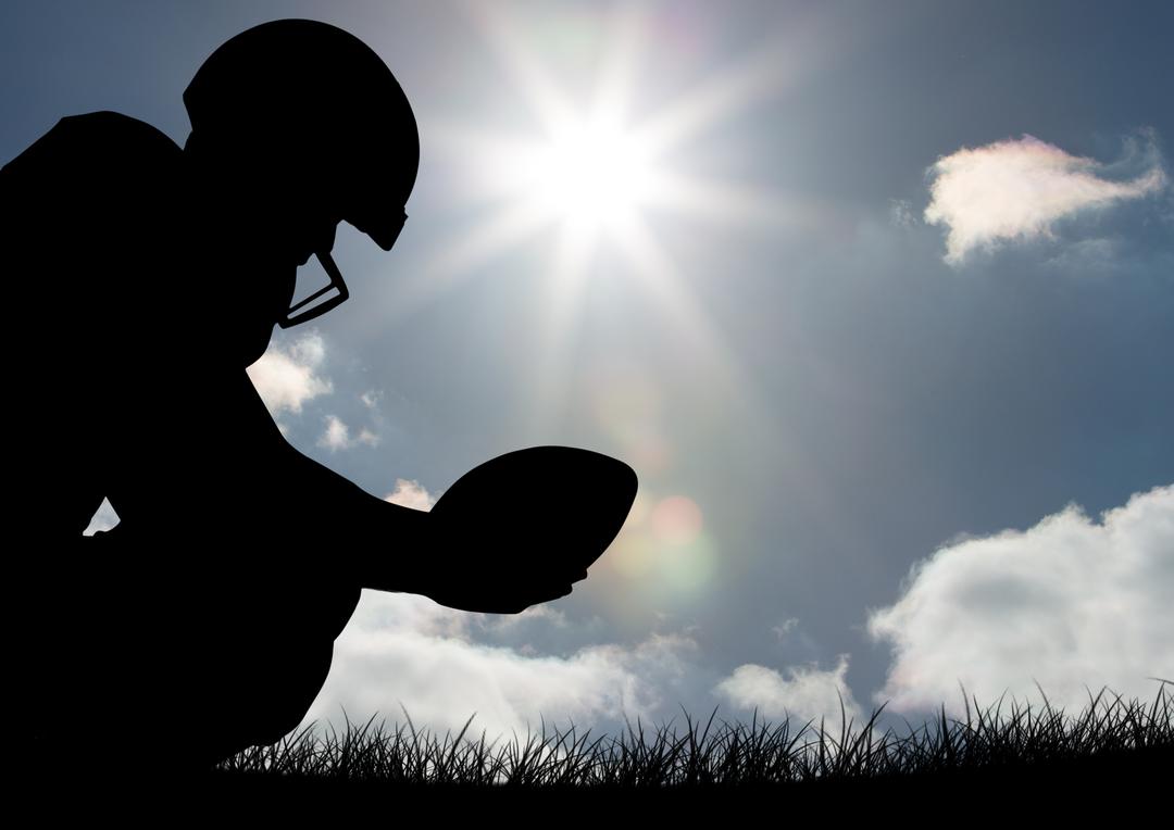 Silhouette of Athlete Holding Rugby Ball on Sunny Day - Free Images, Stock Photos and Pictures on Pikwizard.com