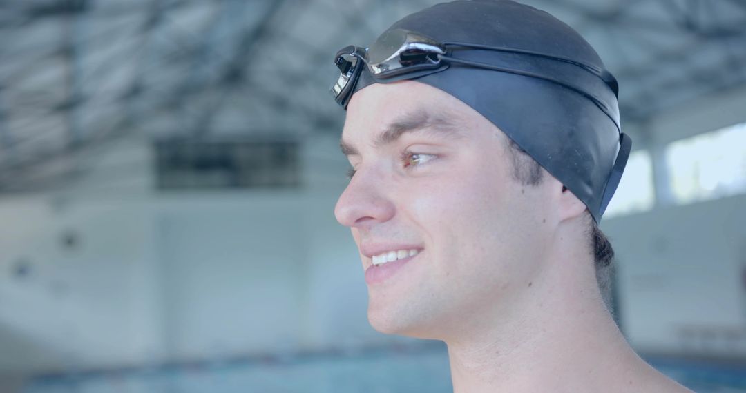 Confident Swimmer Preparing with Swim Cap and Goggles