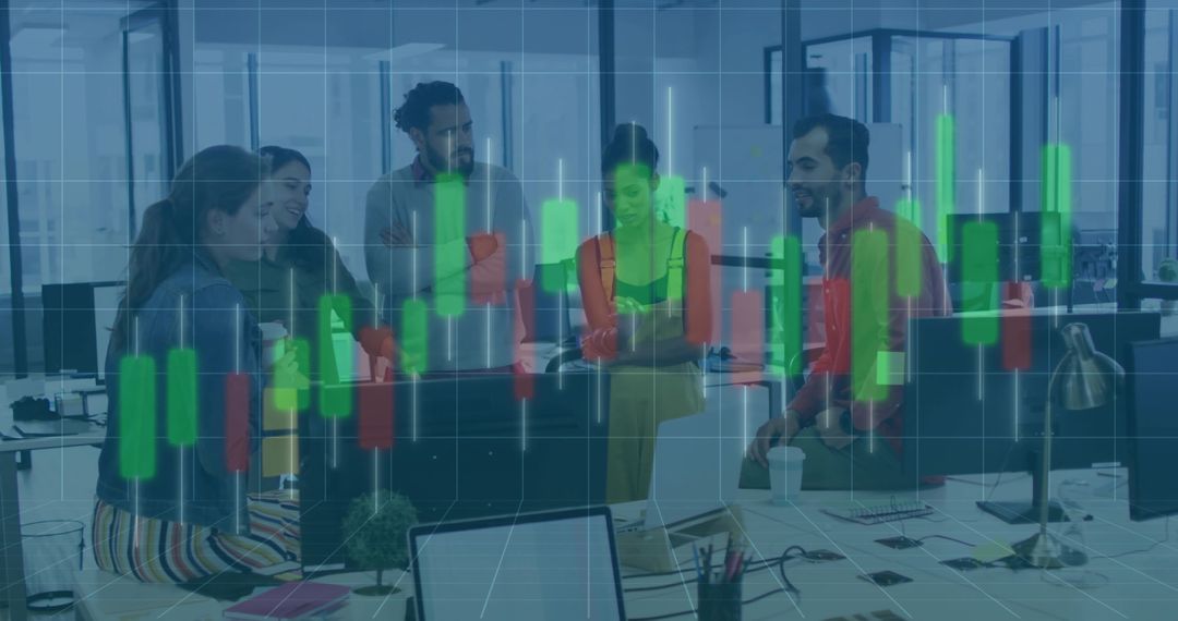 Diverse team collaborating around open-plan workstation with stock market candlestick overlay