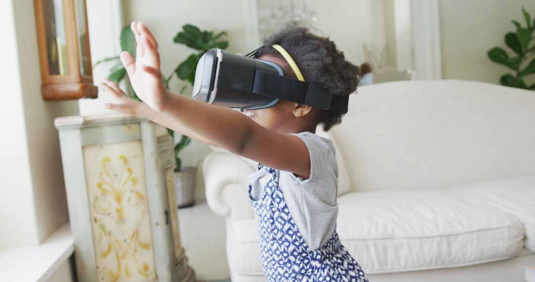 Joyful African American Girl Engaging with Virtual Reality