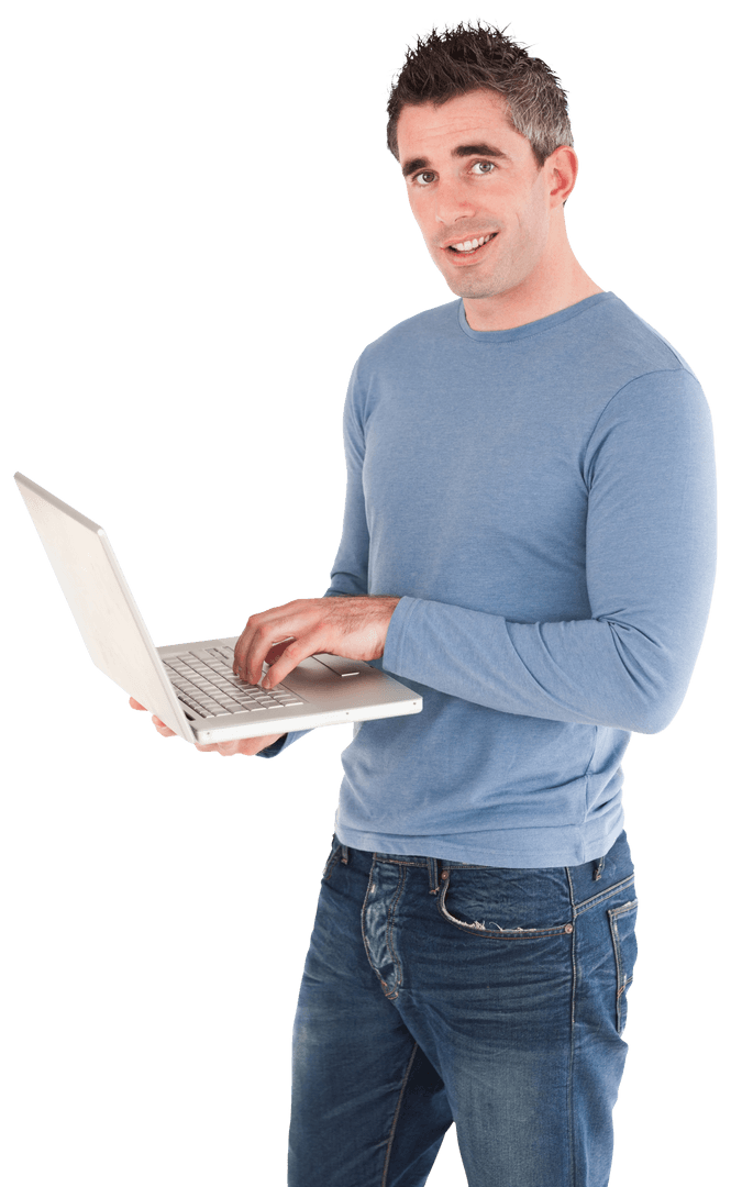 Young Man Smiling While Using Laptop on Transparent Background