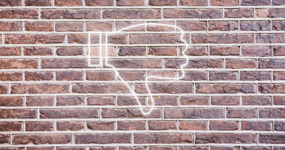 Glowing Neon Thumb Down on Rustic Brick Wall