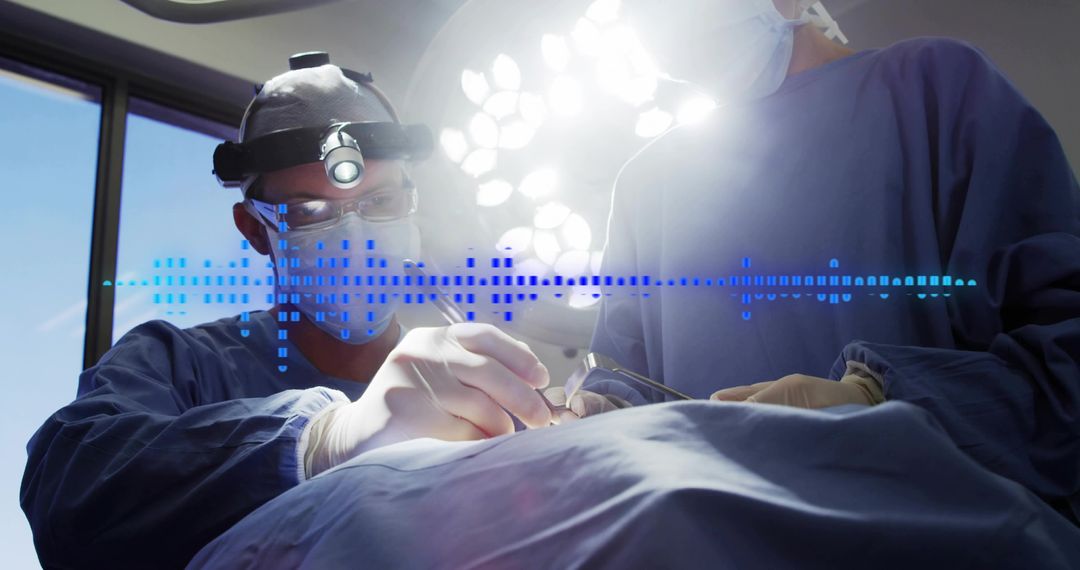 Surgeon performing precision surgery with headlamp and scalpel alongside scrubbed team