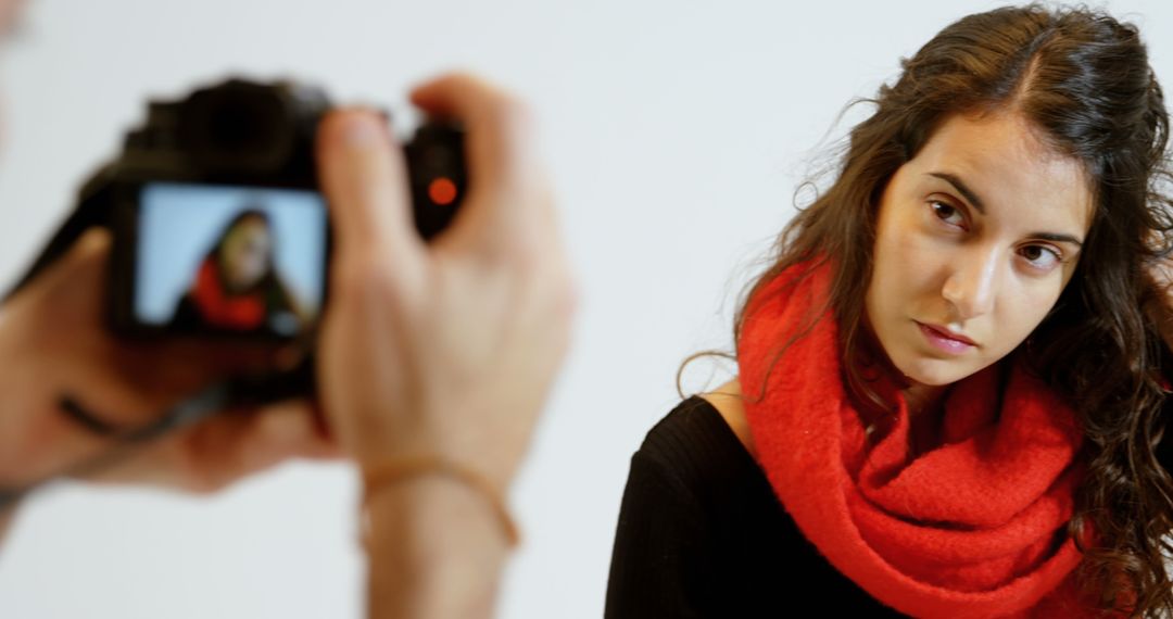 Photographer Capturing Woman in Red Scarf Posed Portrait - Free Images, Stock Photos and Pictures on Pikwizard.com