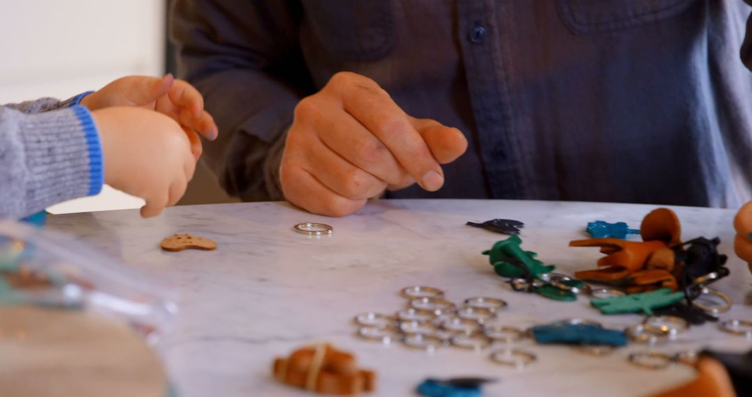 Family Crafting Keychains Together at Home