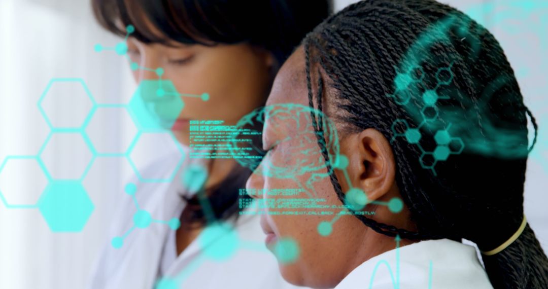 Diverse Female Scientists Analyzing Medical Technology Data