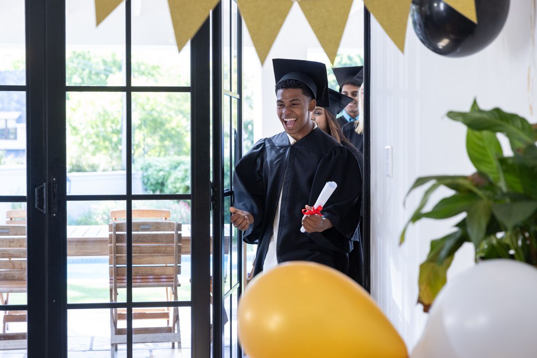 Smiling Graduates Entering Celebration Room in Academic Gowns