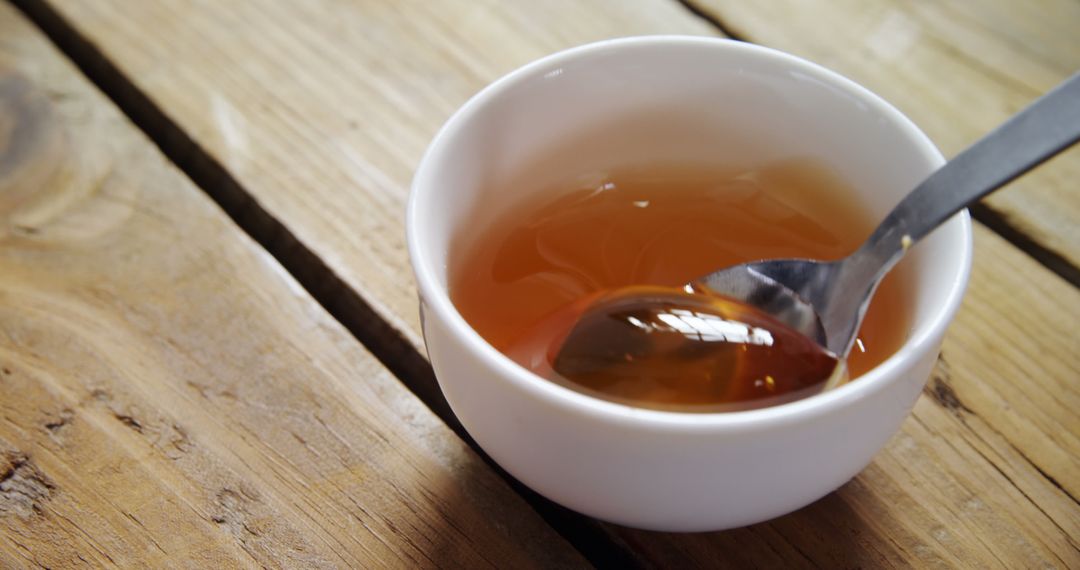 Honey in White Bowl on Rustic Wooden Table - Free Images, Stock Photos and Pictures on Pikwizard.com