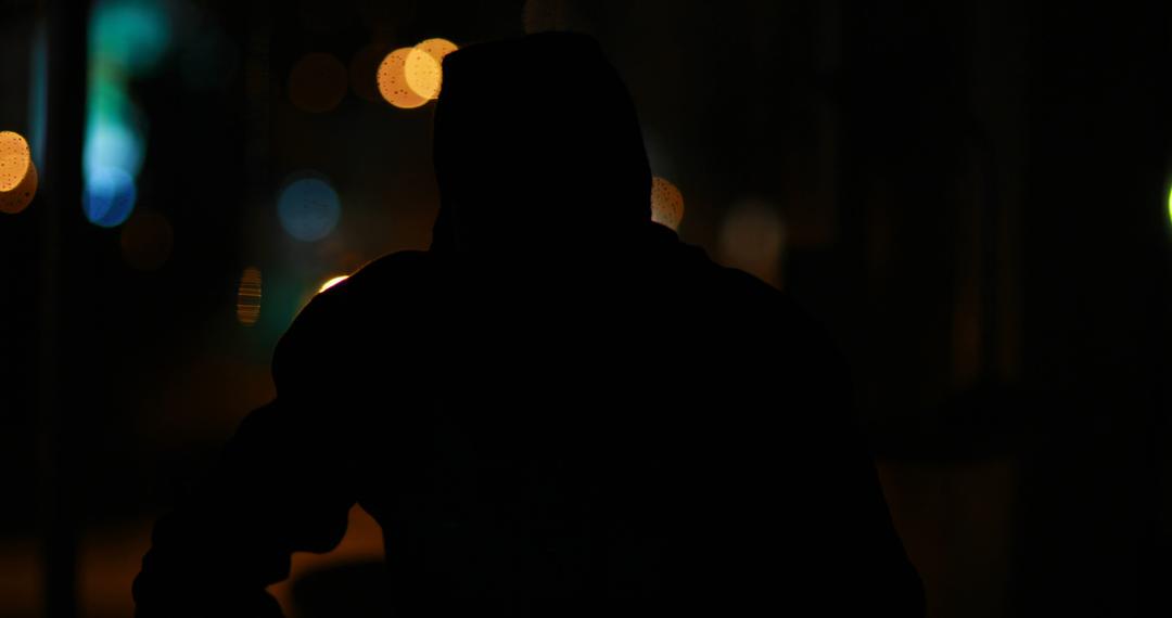 Silhouette of Person at Night with Urban Street Lights - Free Images, Stock Photos and Pictures on Pikwizard.com