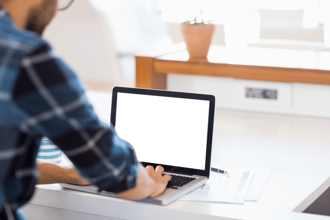 Transparent Laptop Screen with Businessman Working at Desk