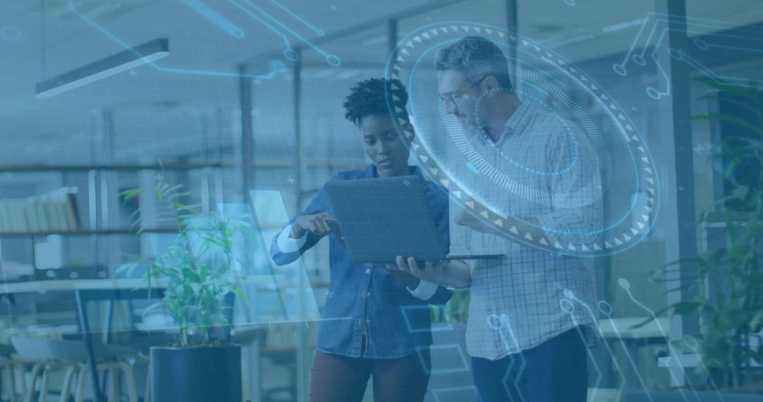 Colleagues Collaborating on Digital Innovation in Modern Office