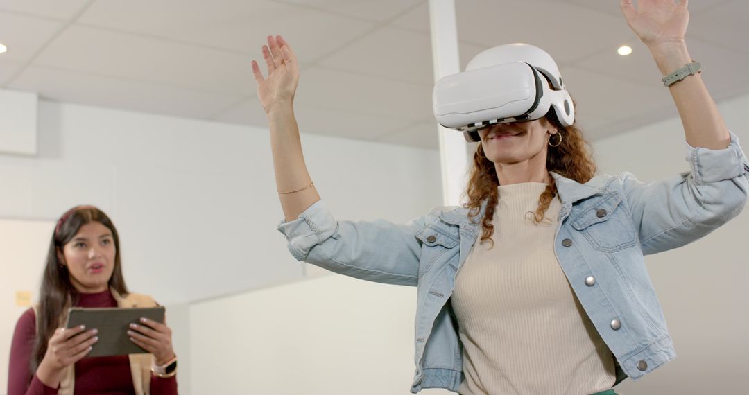 Colleagues Embracing VR Technology in Modern Office Environment