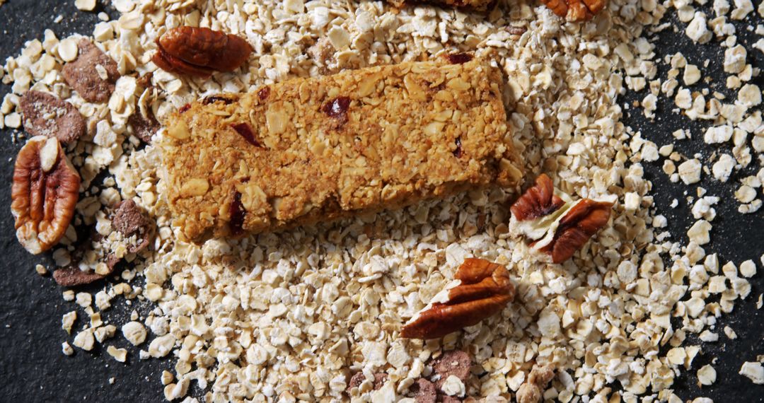 Granola Bar with Oats and Pecans on Dark Surface - Free Images, Stock Photos and Pictures on Pikwizard.com