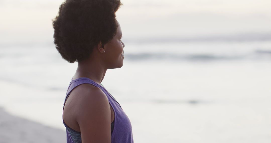 Serene Moment of Woman Gazing at Distant Ocean Horizon - Free Images, Stock Photos and Pictures on Pikwizard.com