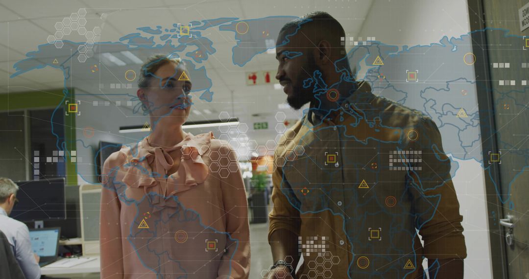 Colleagues Walking in Office with Digital Overlay Representing Global Connectivity Business
