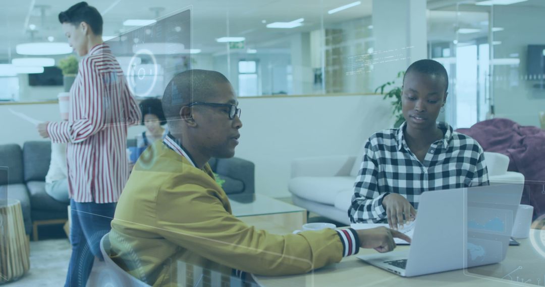 Business Team Collaborating on Virtual Data Insights in Modern Office