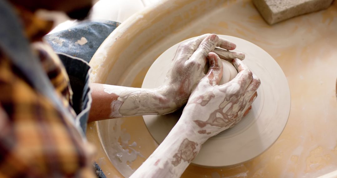 Handcrafting Pottery on Spinning Wheel in Ceramic Studio - Free Images, Stock Photos and Pictures on Pikwizard.com