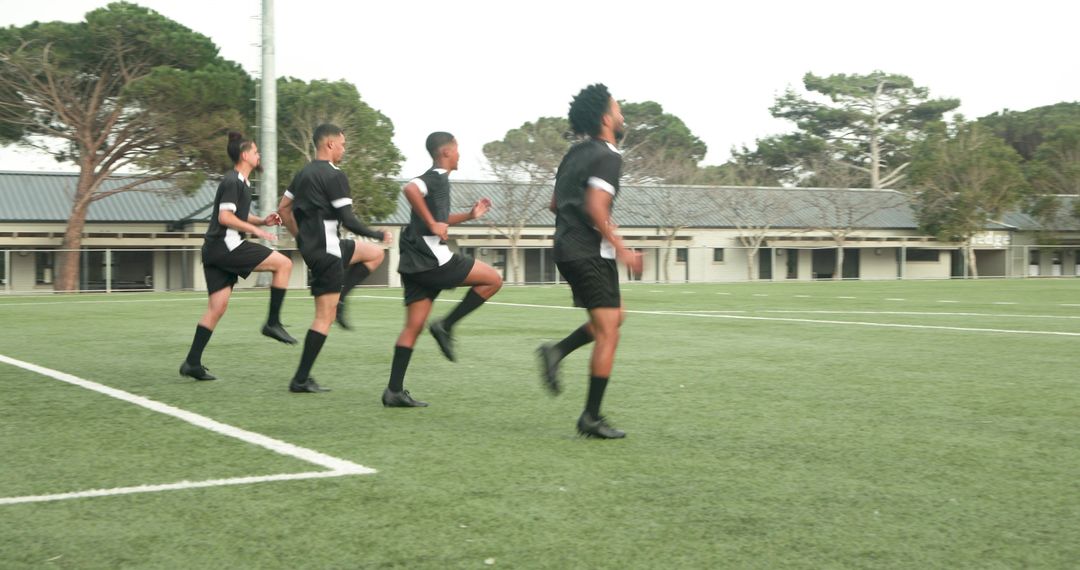 Teen Soccer Players Practicing Drills for Coordination and Teamwork