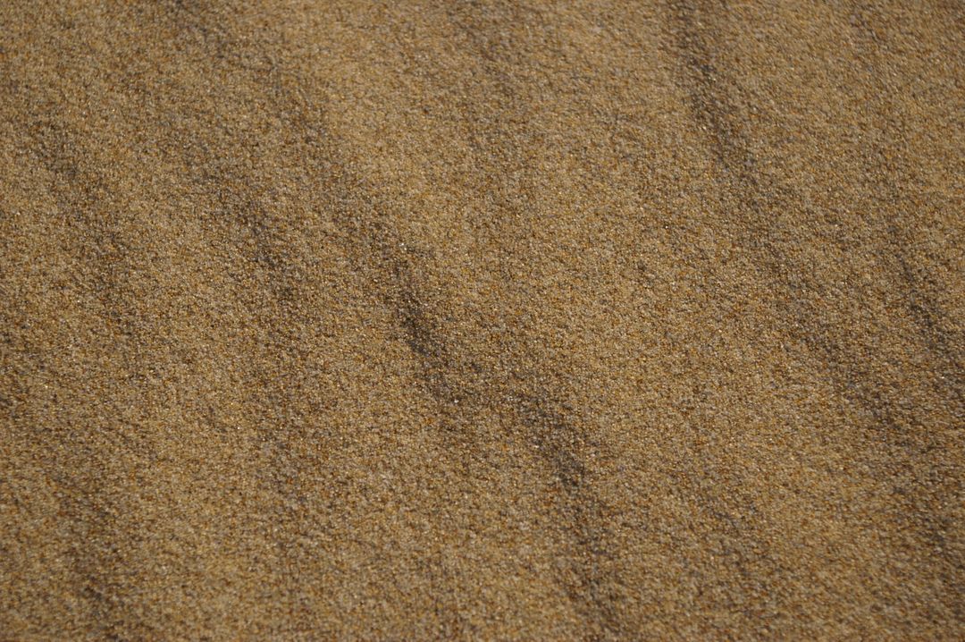 Detail of Fine Sand Texture Viewed Close-Up - Free Images, Stock Photos and Pictures on Pikwizard.com