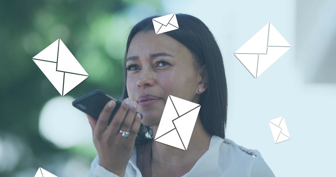 Woman Communicating Using Smartphone with Mail Icons