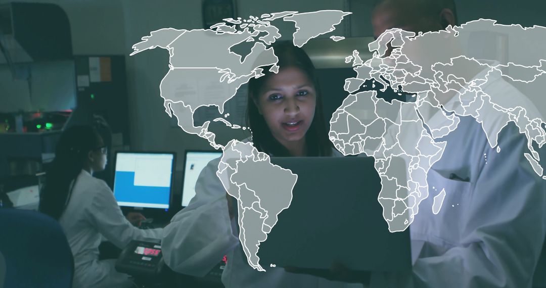 Researchers Analyzing Data in High-Tech Lab with Digital World Map