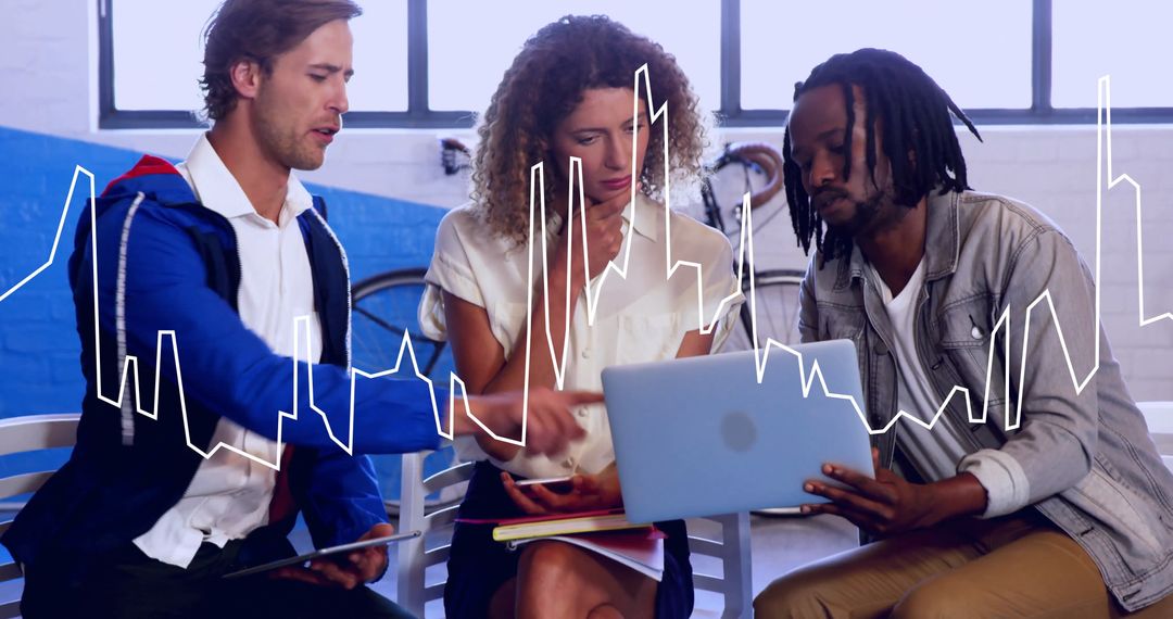 Team Analyzing Data with Technology in Modern Workspace