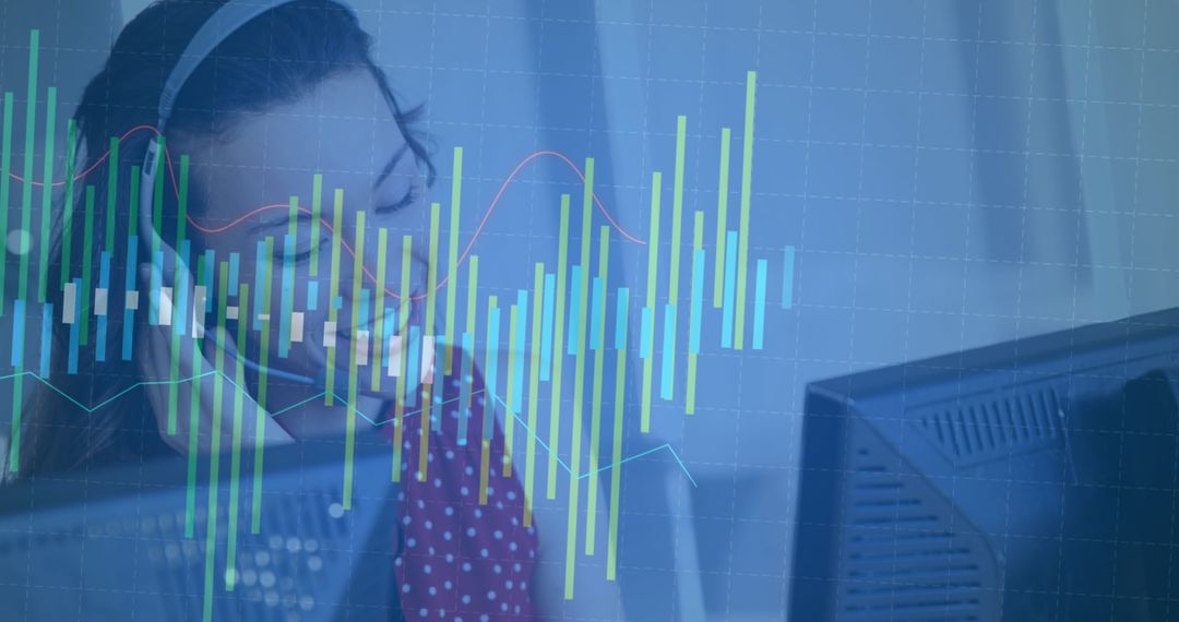 Smiling Businesswoman with Headset Analyzing Data on Computer