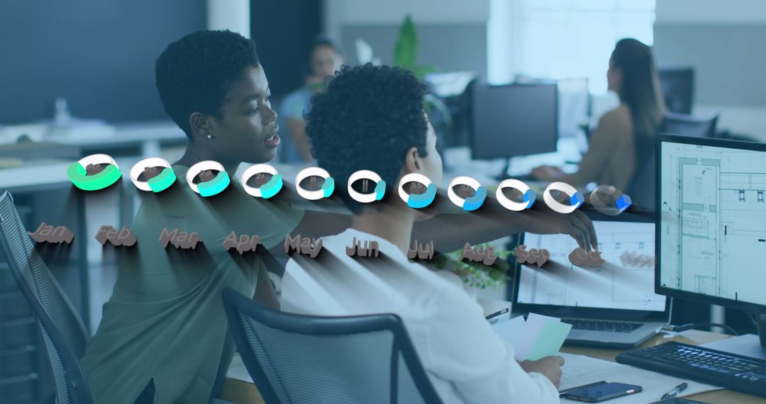 Coworkers Analyzing Financial Data in Collaborative Office Space