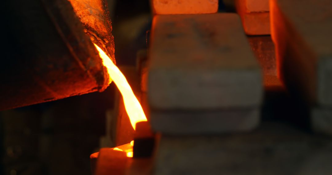 Molten Metal Pouring in Foundry with Glowing Liquid Metal - Free Images, Stock Photos and Pictures on Pikwizard.com