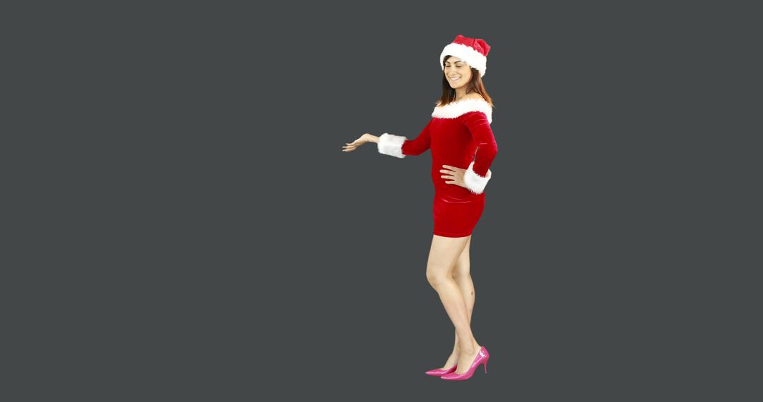 Young Woman Wearing Mrs. Claus Outfit on Gray Background - Free Images, Stock Photos and Pictures on Pikwizard.com