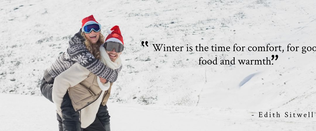 Festive couple enjoying snowy piggyback ride in winter wonderland