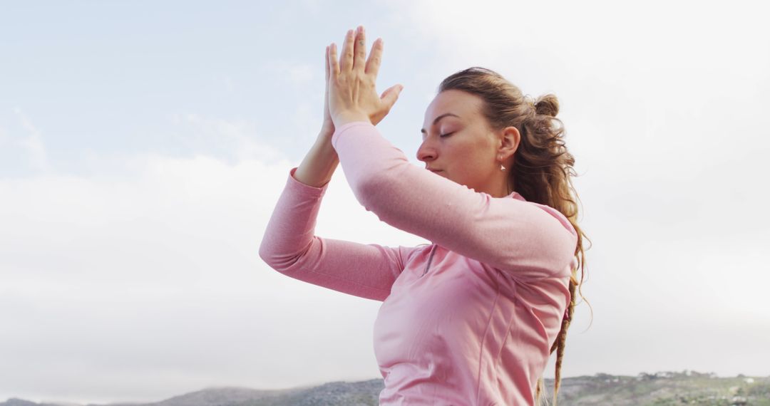 Woman Practicing Yoga Outdoors in Peaceful Mountains - Free Images, Stock Photos and Pictures on Pikwizard.com