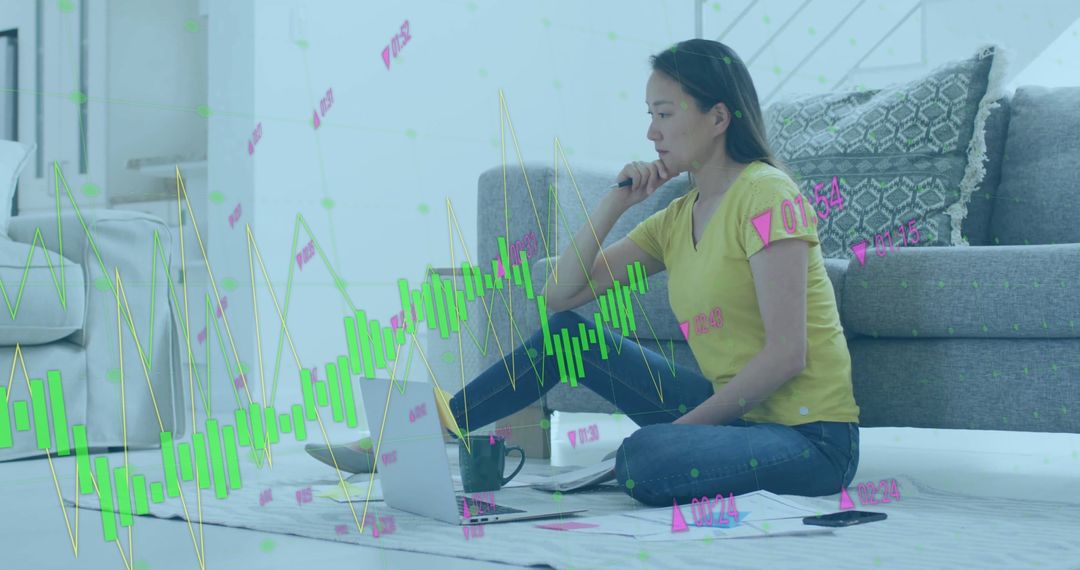 Woman Analyzing Financial Data at Home Using Laptop
