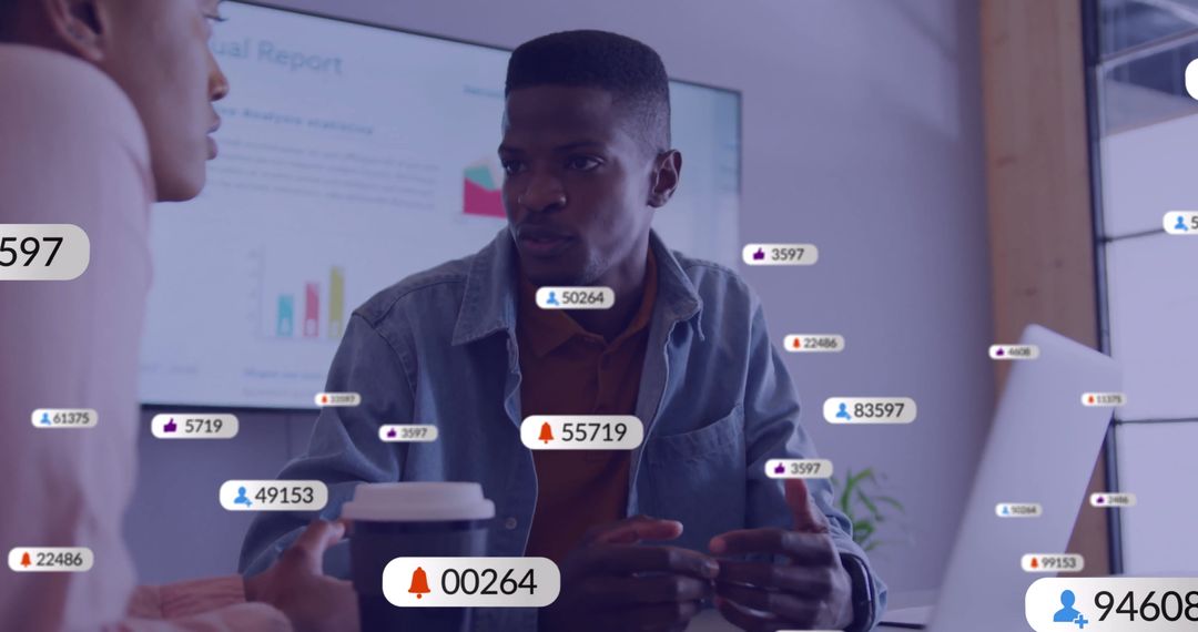 Colleagues Discussing Digital Strategy with Interactive Icons