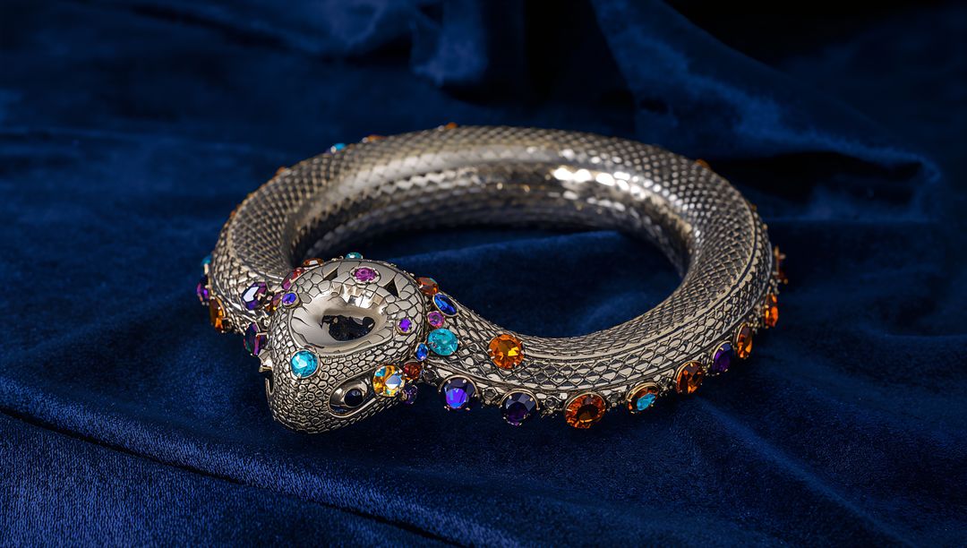 Luxurious Silver Snake Bangle with Multicolored Gemstones