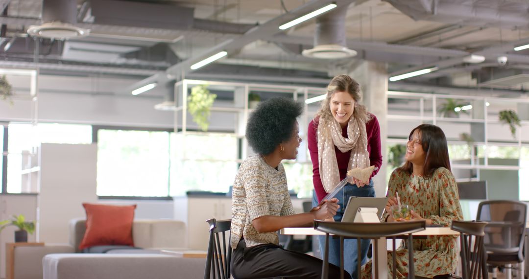 Diverse group of women brainstorming in modern office space - Free Images, Stock Photos and Pictures on Pikwizard.com